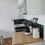 A Cote De La * О