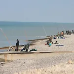 A Cote De La О
