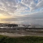 A Cote De La * О